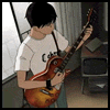 Парень играет на гитаре